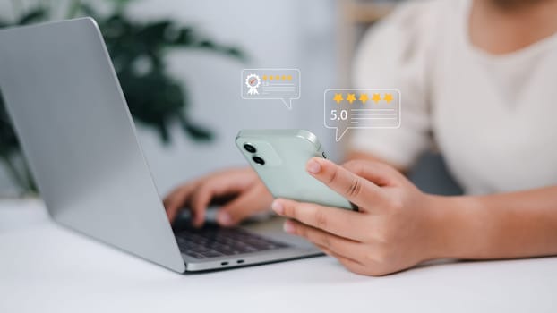 Woman holding smartphone ask customers about their service experience and Rating for a satisfaction survey, Evaluation of product service quality by customers, Positive customer feedback.