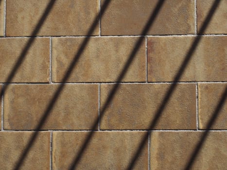 prison jailhouse window bars shadow on tiled floor