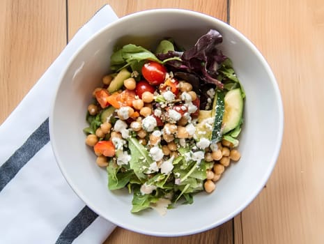Healthy Vegetarian Chickpea salad meal with cucumber and tomatoes