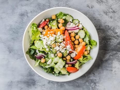 Healthy Vegetarian Chickpea salad meal with cucumber and tomatoes