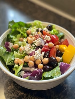 Healthy Vegetarian Chickpea salad meal with cucumber and tomatoes