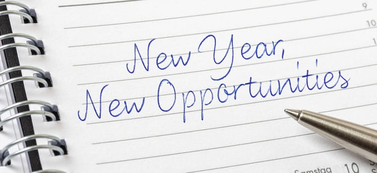 New year, new opportunities written on a calendar page