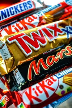 POZNAN, POL - NOV 20, 2024: Variety of popular brands of confectionery products