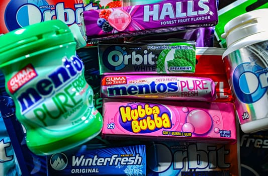 POZNAN, POL - NOV 20, 2024: Variety of popular brands of chewing gums