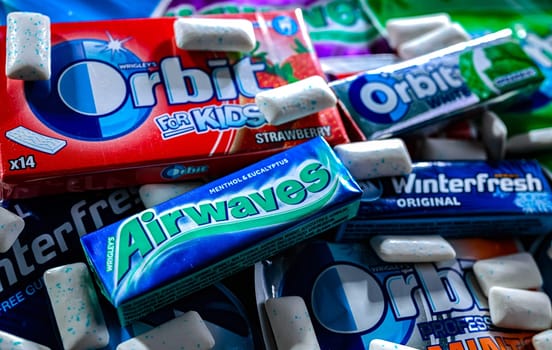 POZNAN, POL - NOV 20, 2024: Variety of popular brands of chewing gums