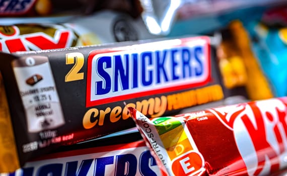 POZNAN, POL - NOV 20, 2024: Variety of popular brands of confectionery products