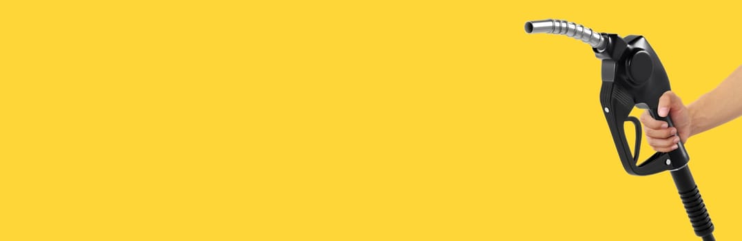 Hands holding Fuel nozzle on yellow background