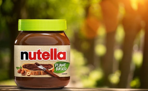 AACHEN, GERMANY - NOV 07, 2024: Pot of vegan Nutella, the popular brand name of a sweetened hazelnut cocoa spread, introduced to the market in 1964 by Italian company Ferrero