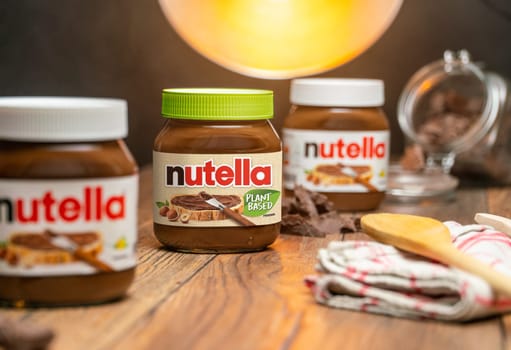 AACHEN, GERMANY - NOV 07, 2024: Pot of vegan Nutella, the popular brand name of a sweetened hazelnut cocoa spread, introduced to the market in 1964 by Italian company Ferrero