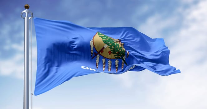 The Oklahoma state flag waving on a clear day. Oklahoma is a state in the South Central region of the United States. 3d illustration render. Rippling fabric