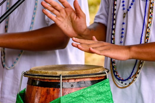 Atabaque drums being used during an Umbanda ceremony in Brazil