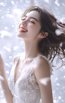 A joyful woman wearing a delicate white dress smiles as soft petals fall gently around her in a bright, airy setting.