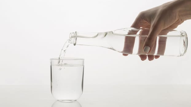 person pouring water glass. Resolution and high quality beautiful photo