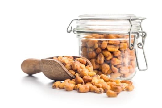 Roasted salted corn snack in scoop  isolated on a white background.