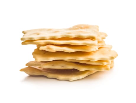 A crispy salted crackers isolated on a white background.