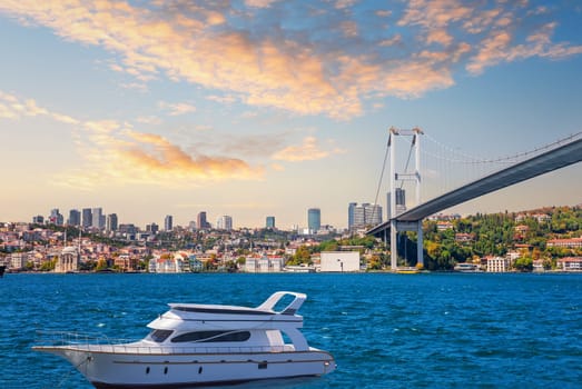 Yacht near the Bosporus bridge and Besiktas view, Istanbul.
