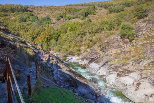 Garganta de los Infiernos Reserve. Los Pilones pedestrain bridge at bottom, Extremadura, Spain