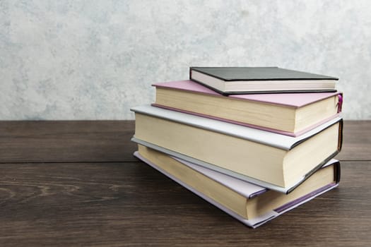 front view book arrangement wooden table