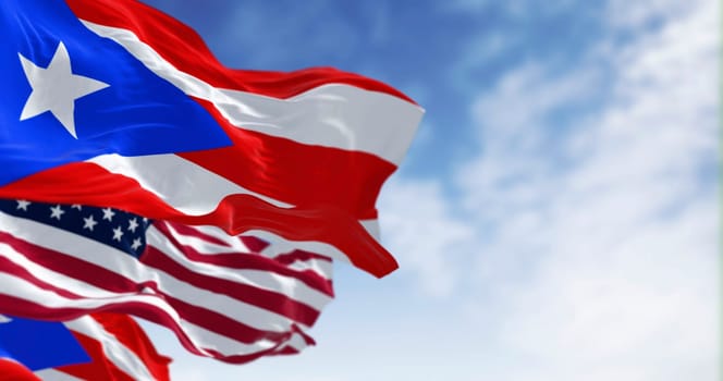 Flag of Puerto Rico waving with the United States flag on a clear day. Puerto Rico is a Caribbean island and unincorporated territory of the United States. 3D illustration render. Rippling fabric
