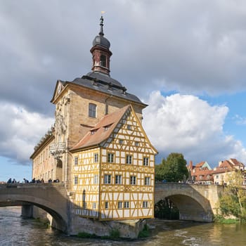 The Old Town Hall on an artificial island in the River Regnitz in the old town of Bamberg in Bavaria, Germany
