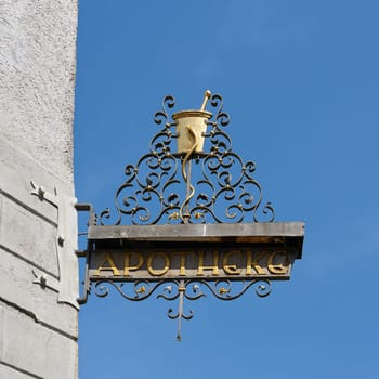 Guild sign on the facade of an old pharmacy in the old town of Constance on Lake Constance, Bodensee