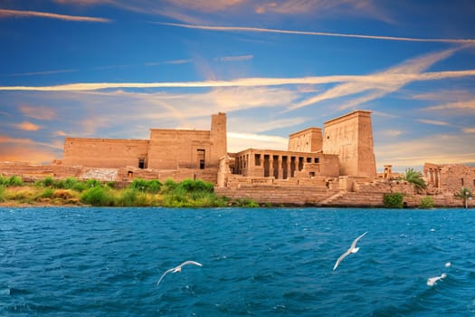 Philae Temple on Agilkia Island by the Nile, sunset view, Aswan, Egypt.