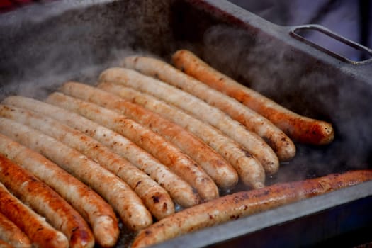 barbecue with Bratwurst on a German Christmas market