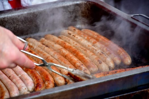 barbecue with Bratwurst on a German Christmas market