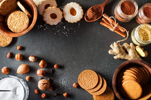 Background with tasty homemade sugar cookies of all shapes and sizes. Top view with copy space. Making and baking cookies