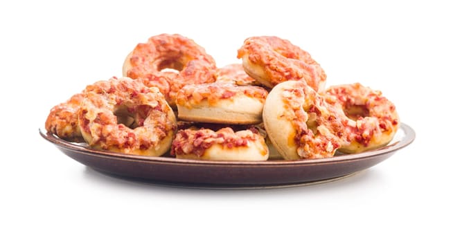 Mini pizza bagels on plate  isolated on a white background.