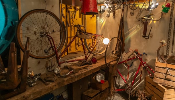 Old bicycle repair shop. Fixing mechanic issues in a garage, bike maintenance