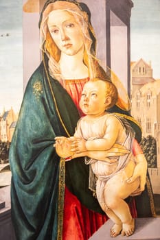 Turin, Italy - 12 December 2023: Madonna and Child, by Sandro Botticelli, ca 1490 - tempera on panel