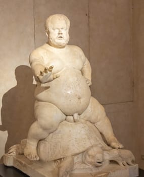 Florence, Italy - 28 December 2023: Morgante riding a tortoise, marble statue by Valerio Cioli, 1568. The dwarf Morgante belonged to the Medici family entourage. Original sculpture located in Boboli Gardens.