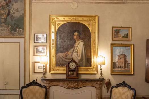 Masino, Italy - 12 December 2023: old apartment interior, early 20th century furniture, living room, nobody