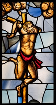 Milan, Italy - July 28 2024: detail of stained glass window in Milan Cathedral, 1480 ac