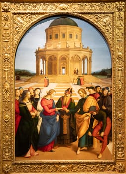 Milan, Italy - 23 September 2023: Brera antique painting museum. Marriage of the Virgin, by Raffaello Sanzio - Raphael, 1504