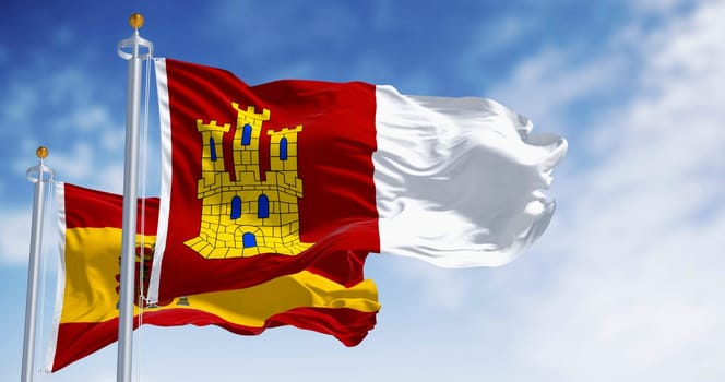 Flags of Castilla-La Mancha and Spain waving on a clear day. Autonomous community of Spain. 3d illustration render. Rippling fabric