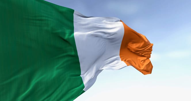Ireland national flag waving in the wind on a clear day. Vertical tricolour of green, white, and orange. European Union state member. 3d illustration render. Fluttering fabric.