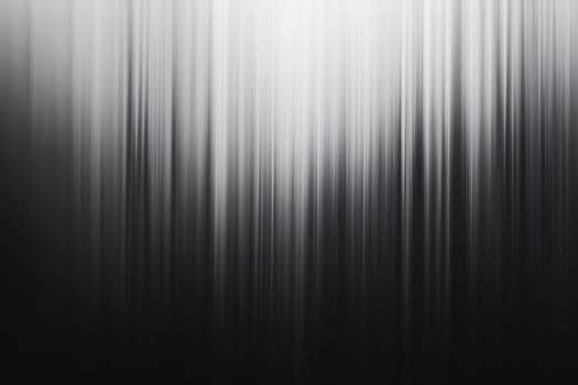 Soft gradients of black and white create a calming, abstract background that evokes a sense of tranquility and minimalism.