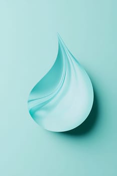 A smooth, turquoise water droplet shape emerges from a soft background, showcasing fluid curves that convey tranquility and freshness.
