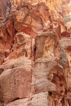Colorful rocks of Siq canyon in Petra,  Jordan. Vertically.