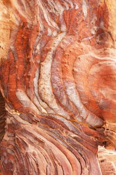 Natural background from the rock. Siq canyon in Petra, Jordan. Vertically.
