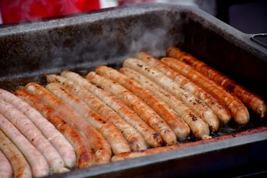 barbecue with Bratwurst on a German Christmas market