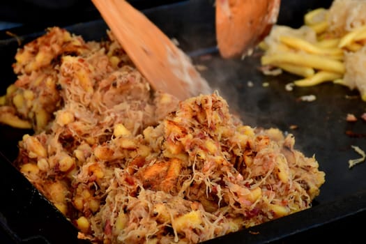potato dumblings with sauerkraut at a German Christmas market