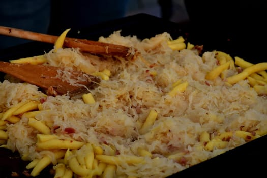 potato dumblings with sauerkraut at a German Christmas market