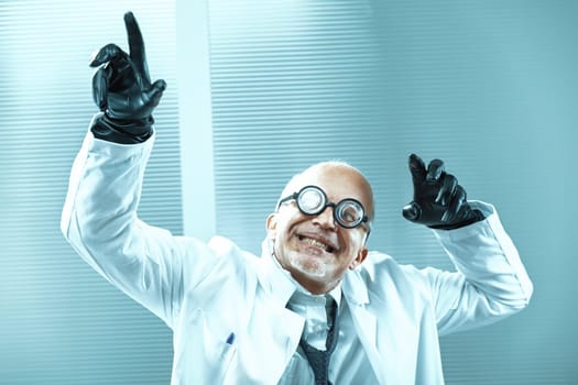 Eccentric senior scientist wearing black gloves and round glasses raises his arms in a celebratory gesture, expressing joy and excitement within a laboratory setting
