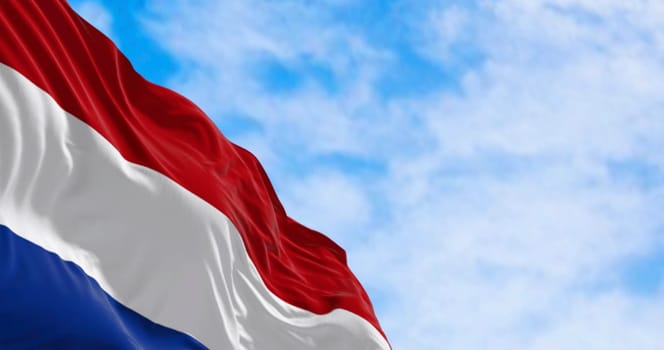 The national flag of the Netherlands waving in the wind on a sunny day. Red, white, and blue stripes. European country. 3D illustration render. Fluttering fabric. Dutch patriotism.