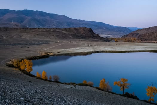 Mountain lake among the mountains on altai. The water surface of the lake.