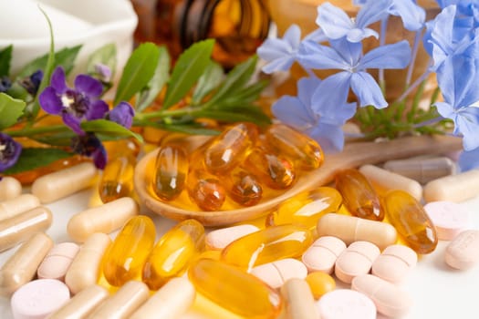 Alternative medicine herbal organic capsule with vitamin E omega 3 fish oil, mineral, drug with herbs leaf natural supplements for healthy good life.