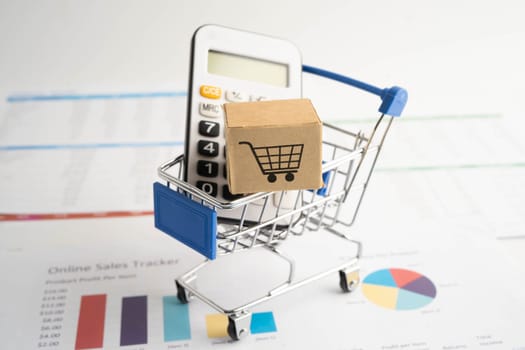 Online shopping, Shopping cart box on business graph, import export, finance commerce.
